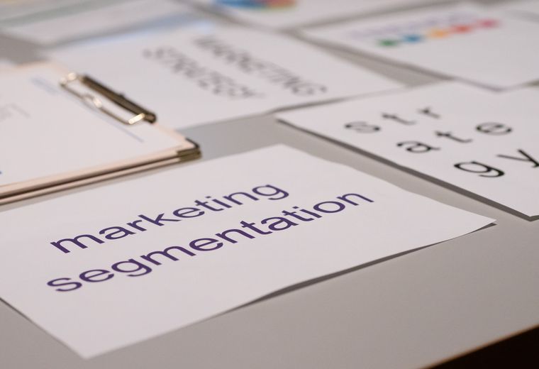 Printed marketing strategy materials on a desk